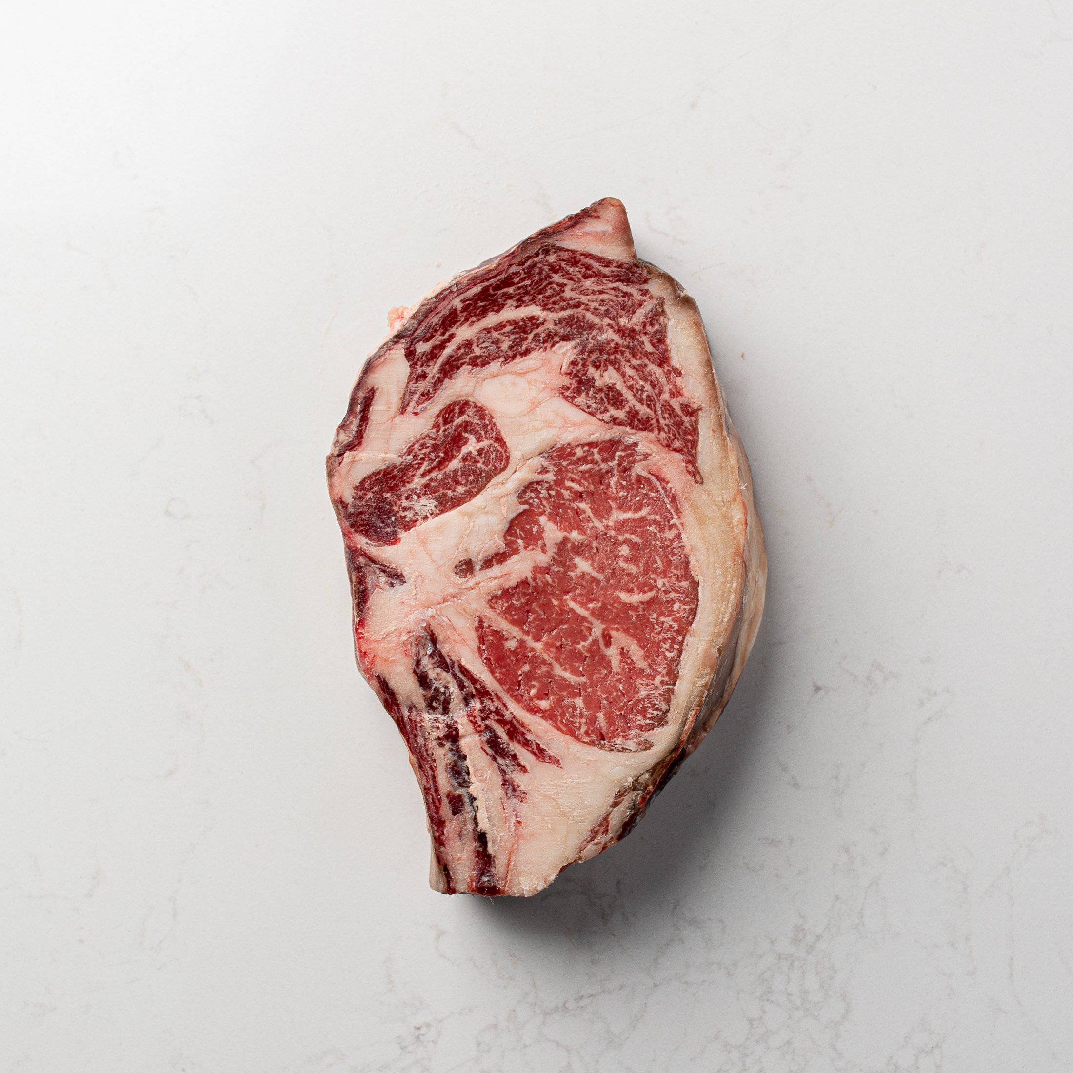 Dry Aged Bone In Strip Steak - The Butcher Shoppe
