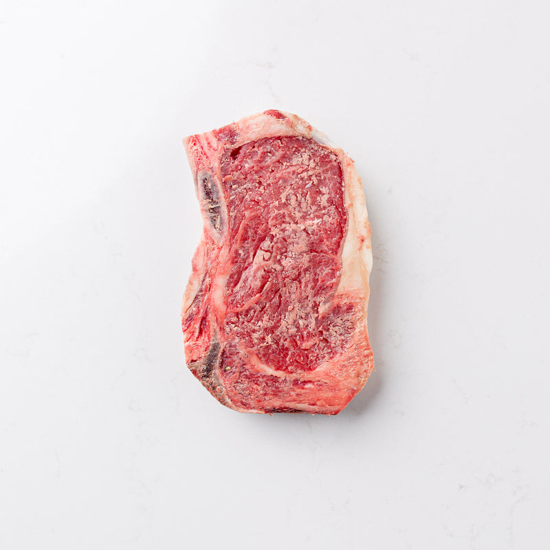 Dry Aged Bone-In Prime Striploin Steak from The Butcher Shoppe in Toronto, Ontario