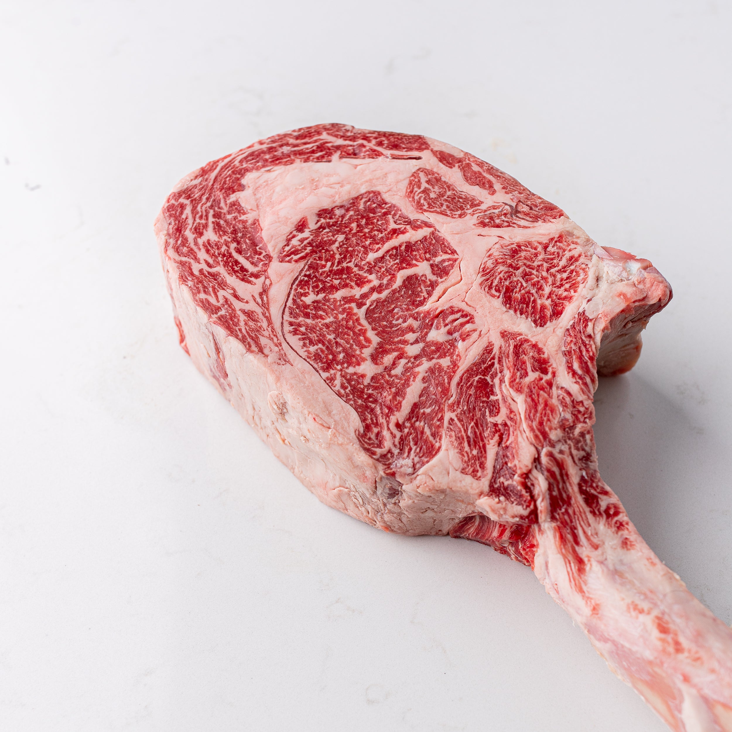 Marbling on an Australian Wagyu Tomahawk Steak from The Butcher Shoppe