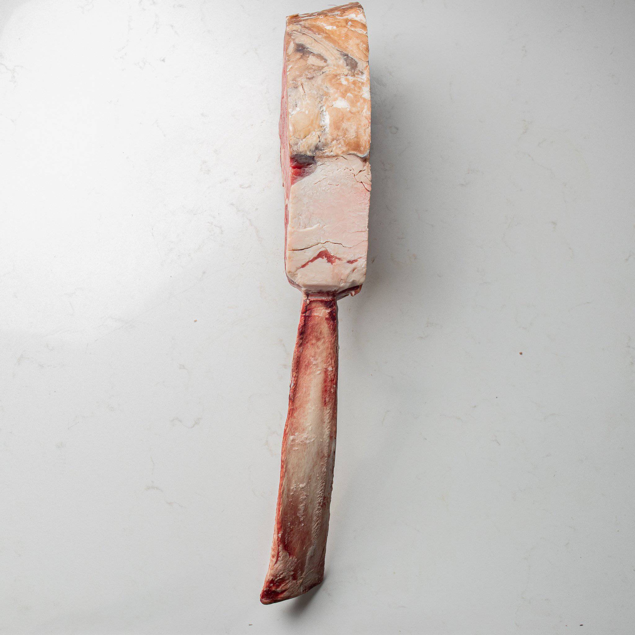 Side View of the Fat on an Angus Dry Aged Tomahawk Steak from The Butcher Shoppe