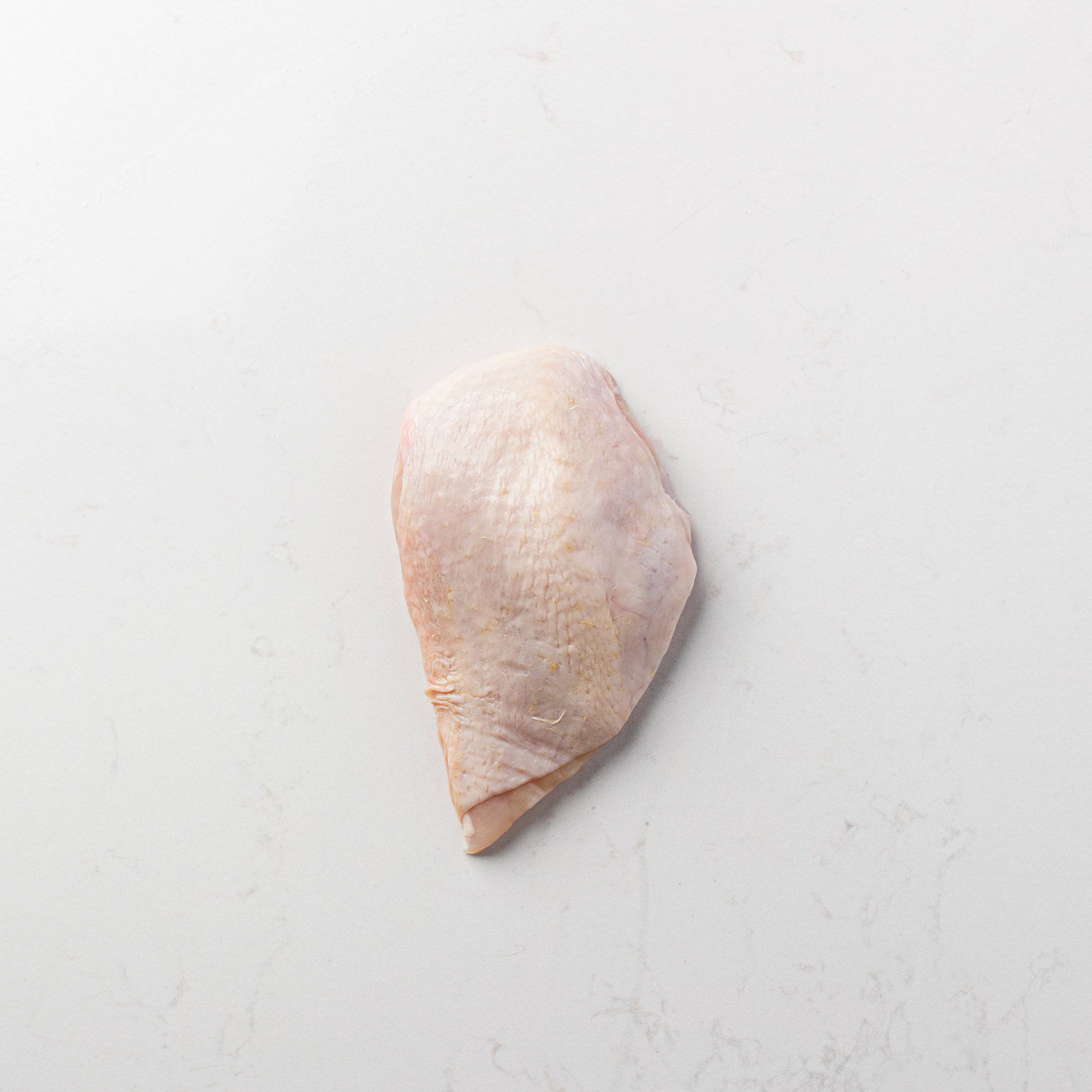 A Skin-On Boneless Chicken Breast from The Butcher Shoppe