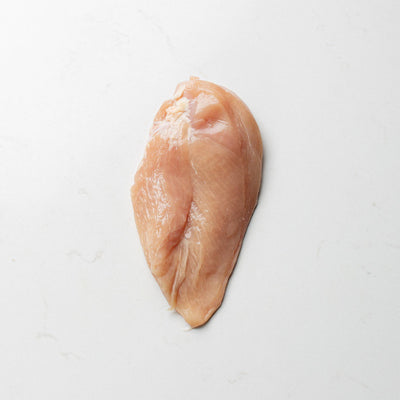 Underside of an Organic Boneless Skinless Chicken Breast from The Butcher Shoppe