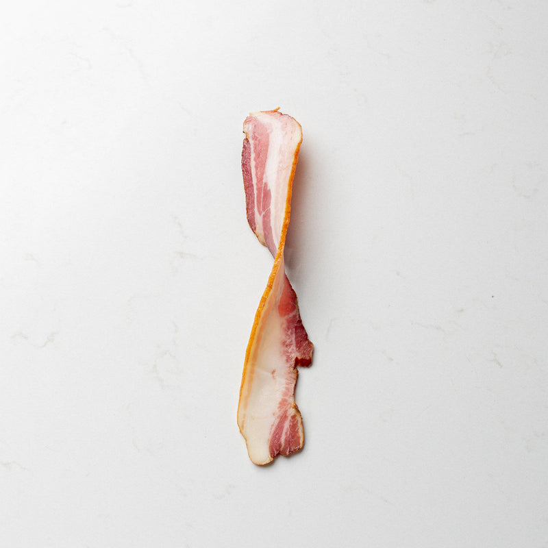 Individual Twisted Piece of Thick Sliced Bacon from The Butcher Shoppe