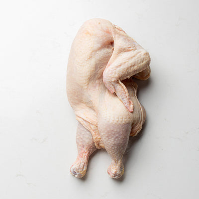 Side View of a Whole Spatchcock Boneless Chicken from The Butcher Shoppe
