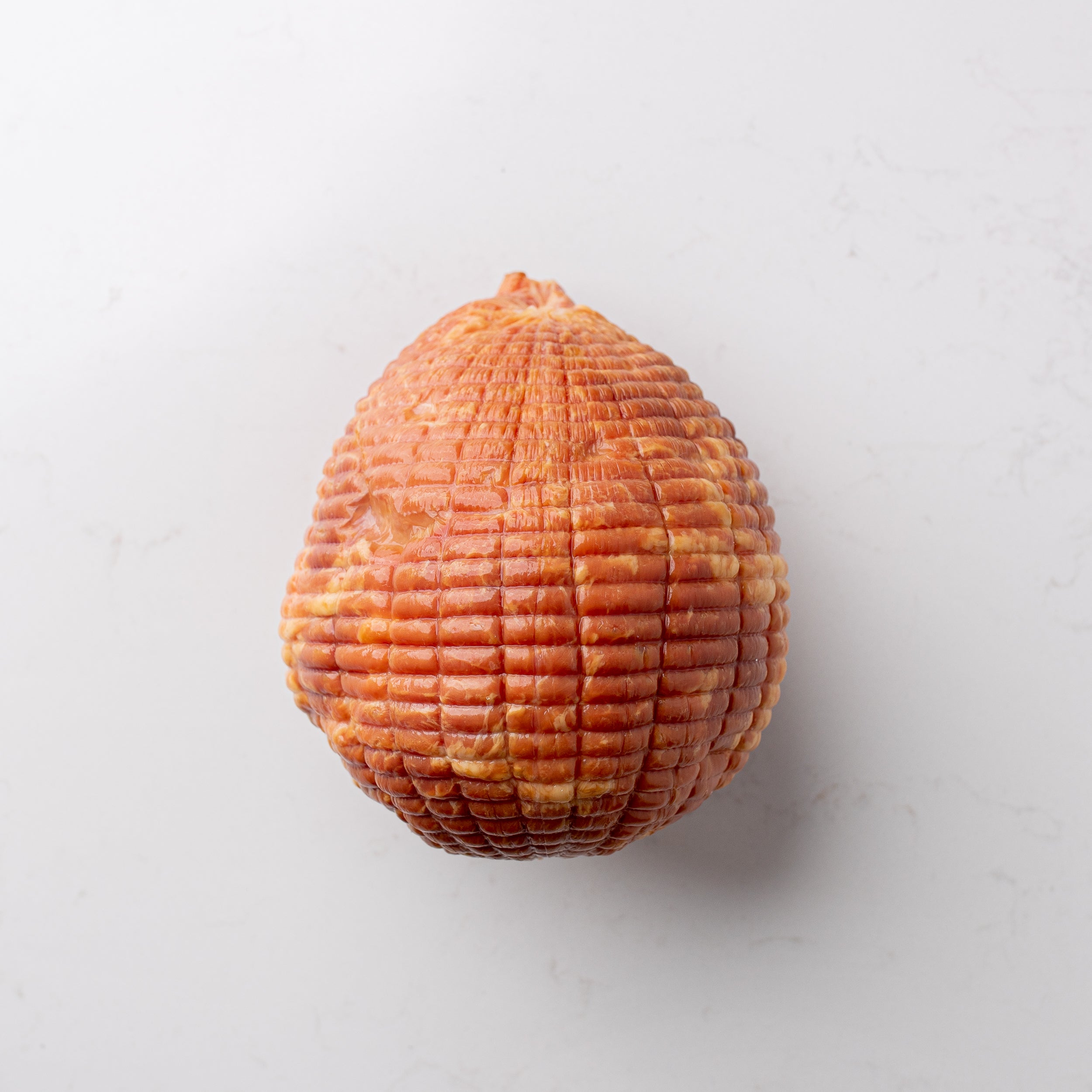 Delightful mini ham, a petite and flavorful option for a variety of culinary creations and occasions.