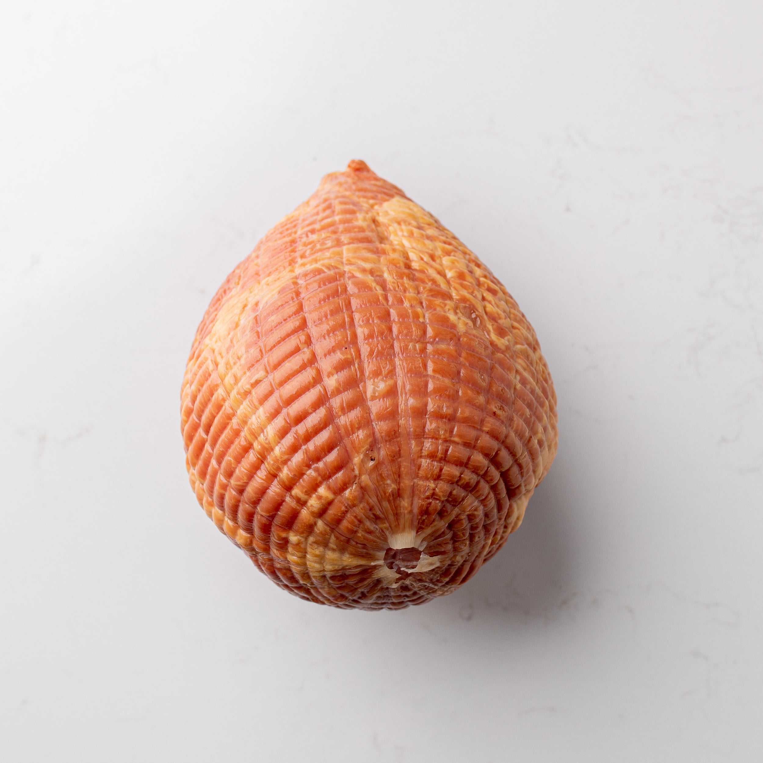 Delightful mini ham, a petite and flavorful option for a variety of culinary creations and occasions.